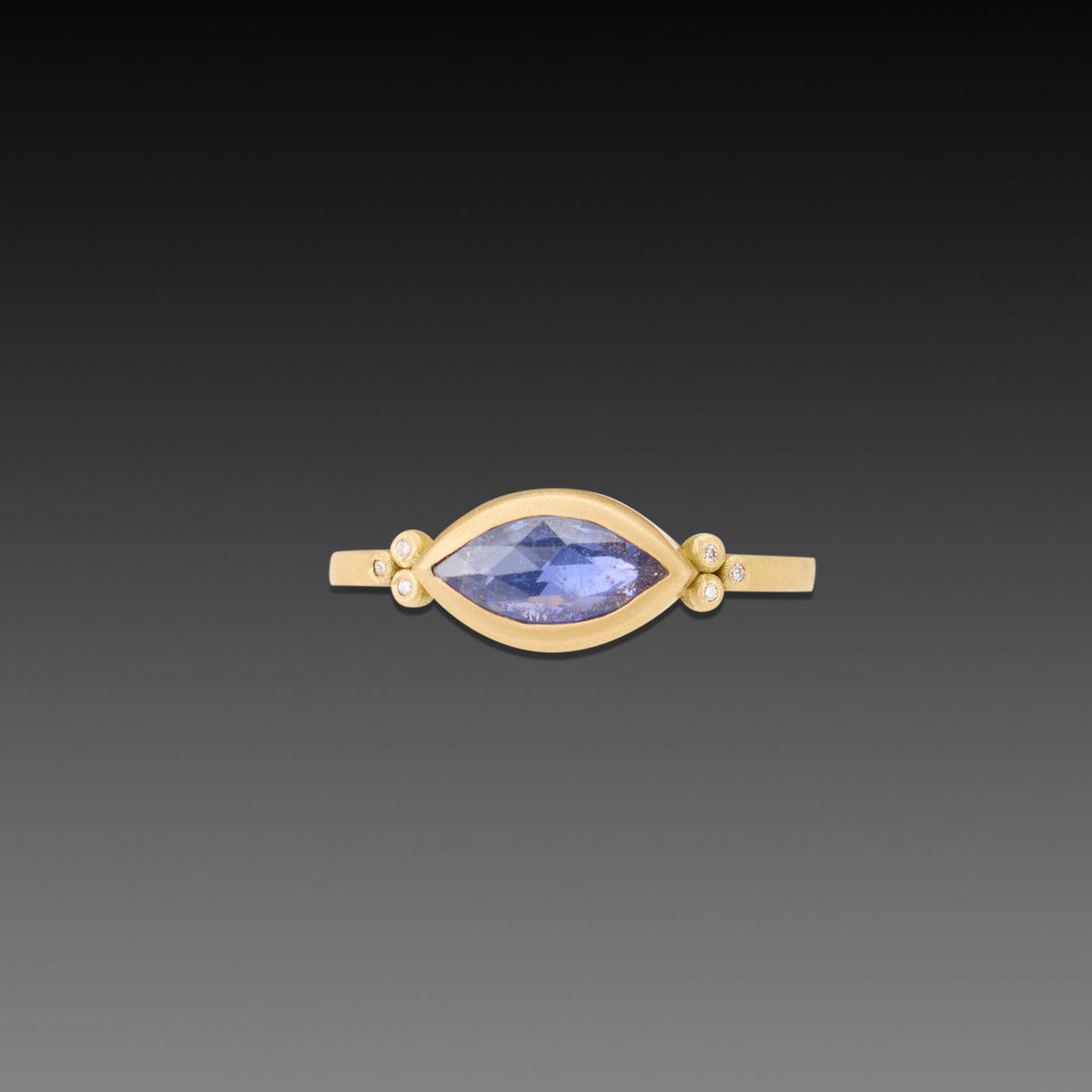 Marquise Blue Sapphire Ring with Diamond Trios