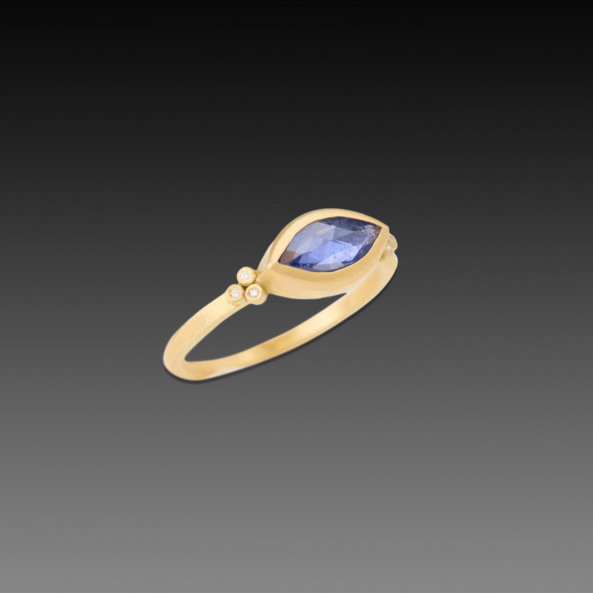 Marquise Blue Sapphire Ring with Diamond Trios