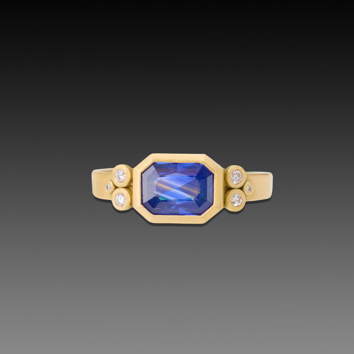 Deep Blue Sapphire Ring with Diamonds