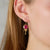 Round Ruby Earrings with Gold Trios