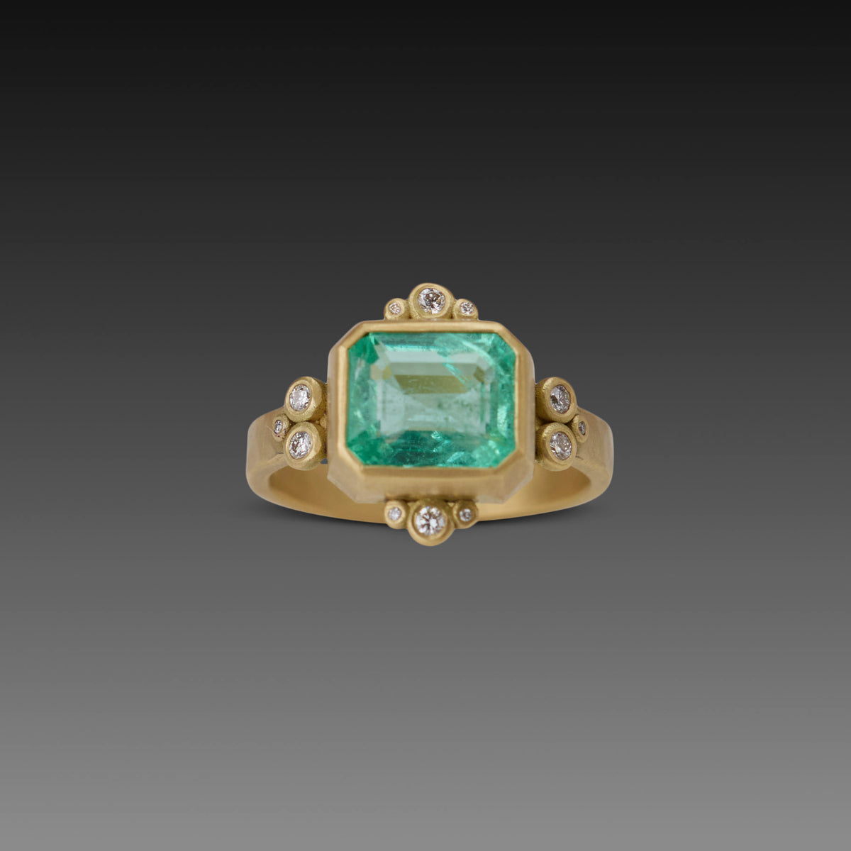 Emerald Ring With Diamond Trios