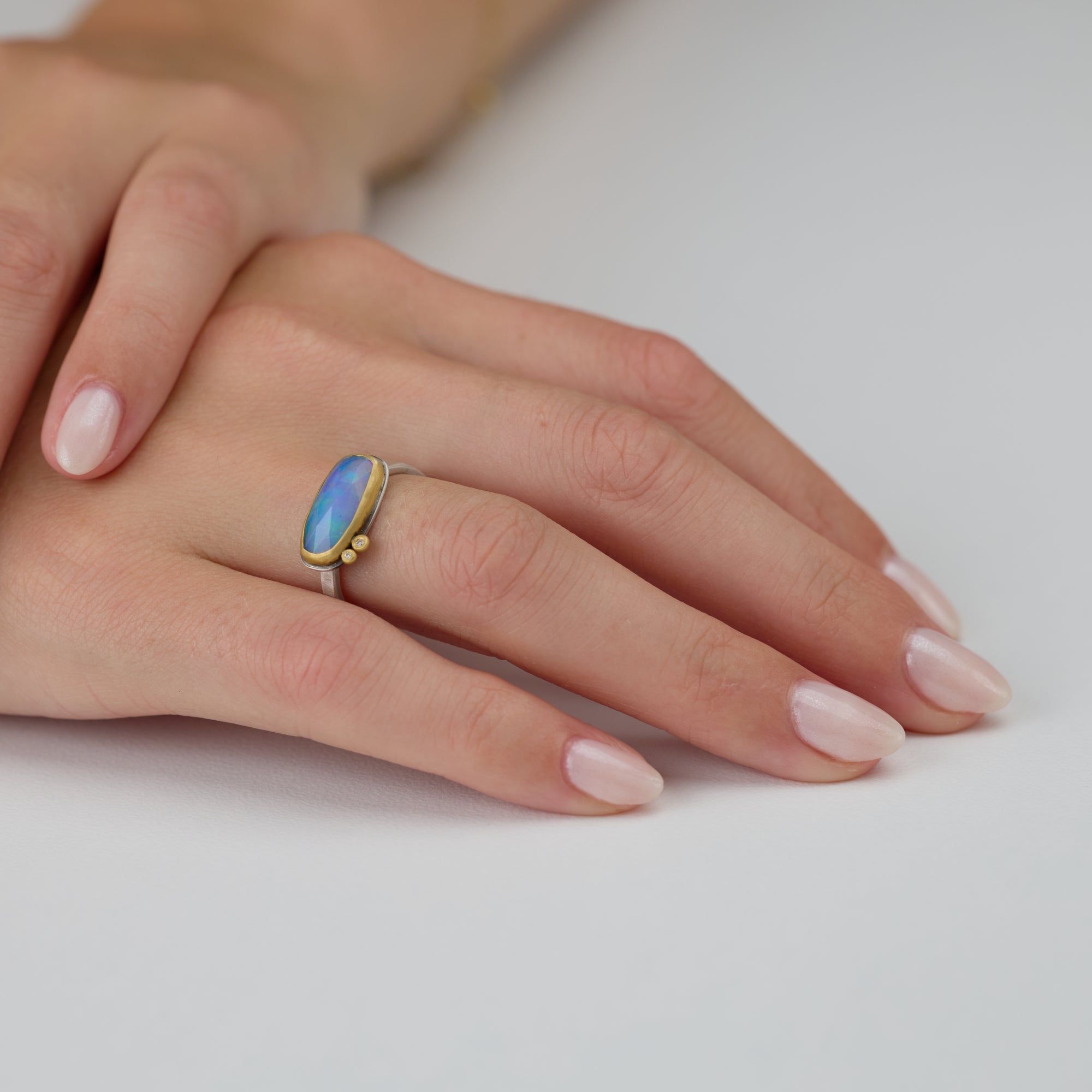 Ethiopian Opal Ring with Two Diamonds