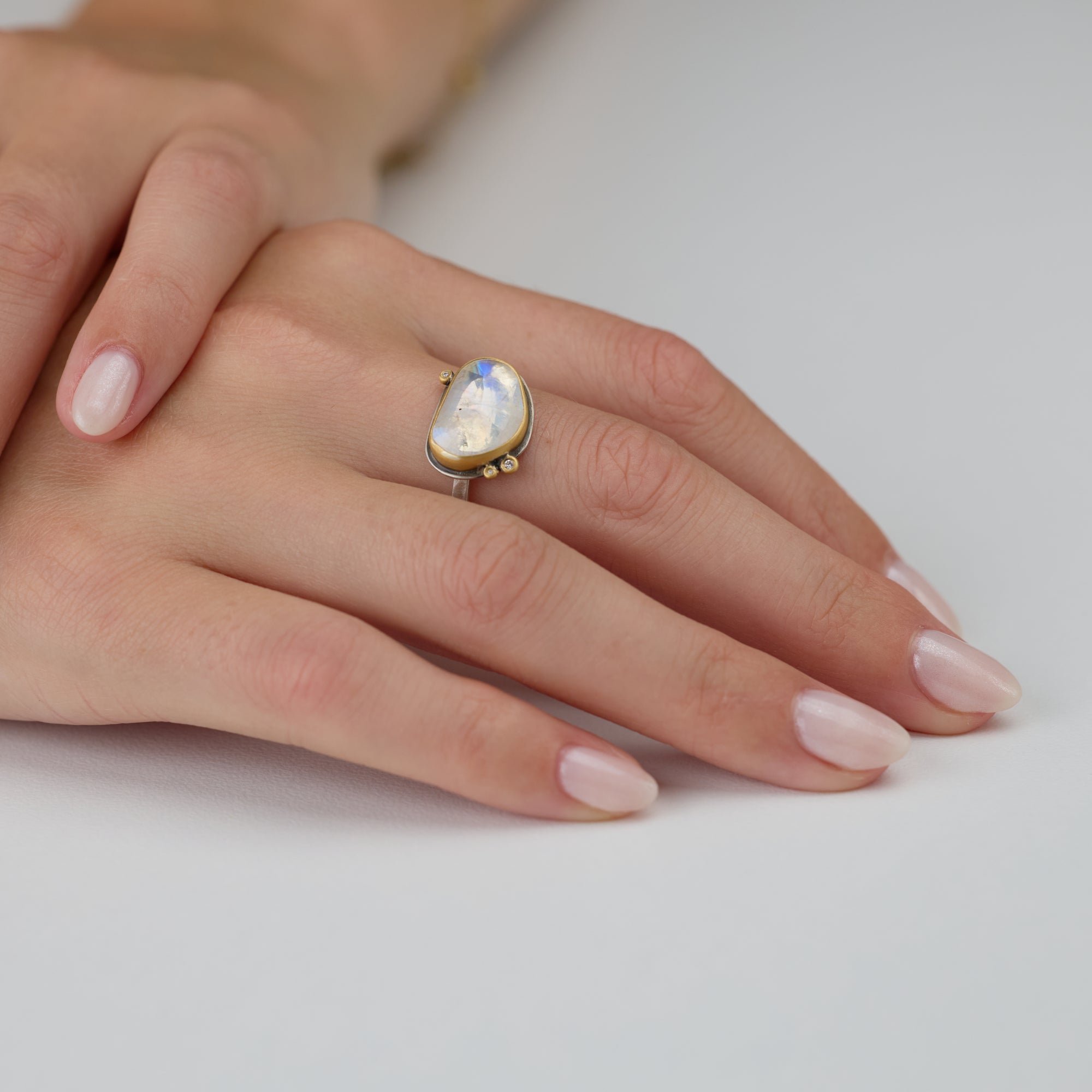 Glowing Rainbow Moonstone Ring with Diamonds