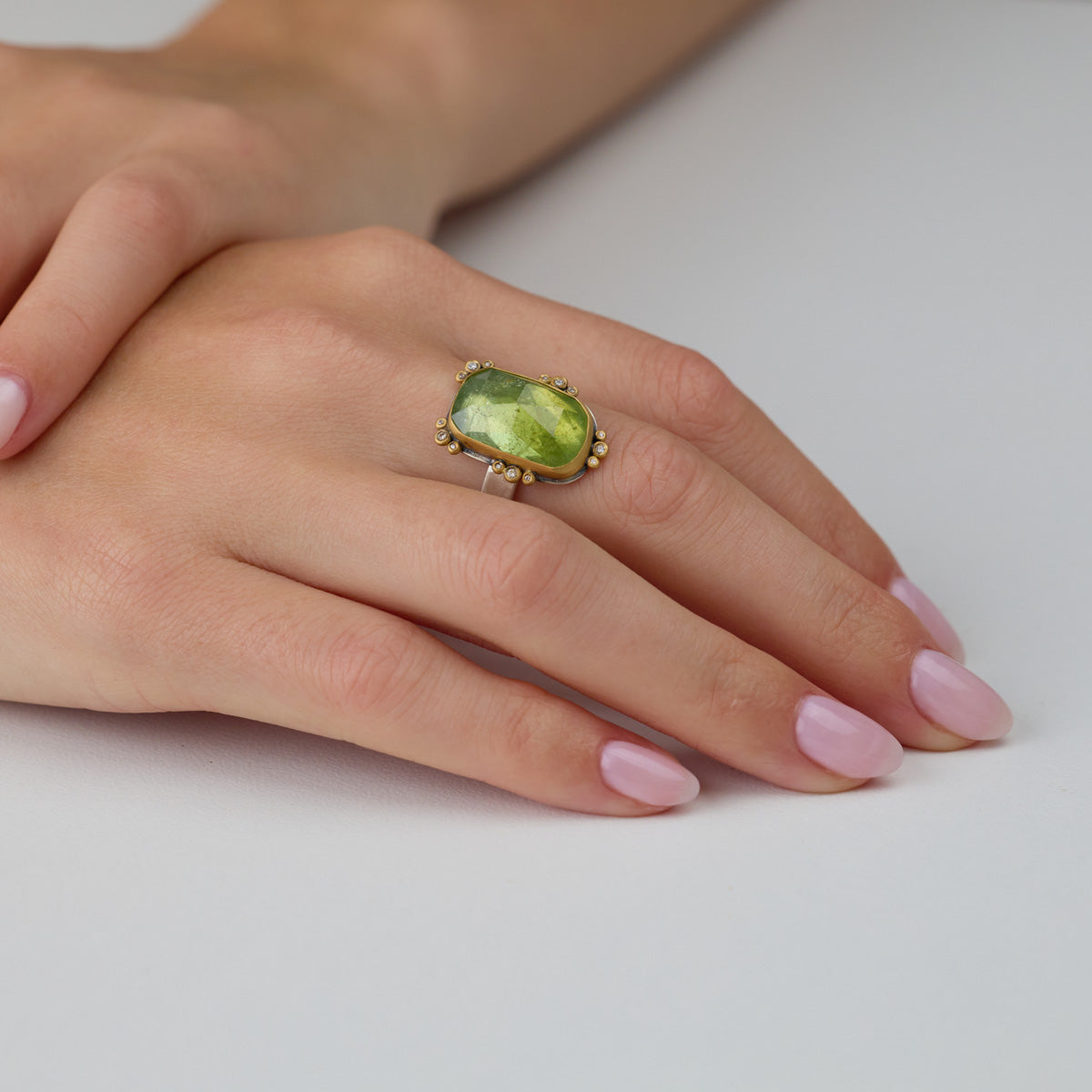 Green Tourmaline Ring with Diamond Trios