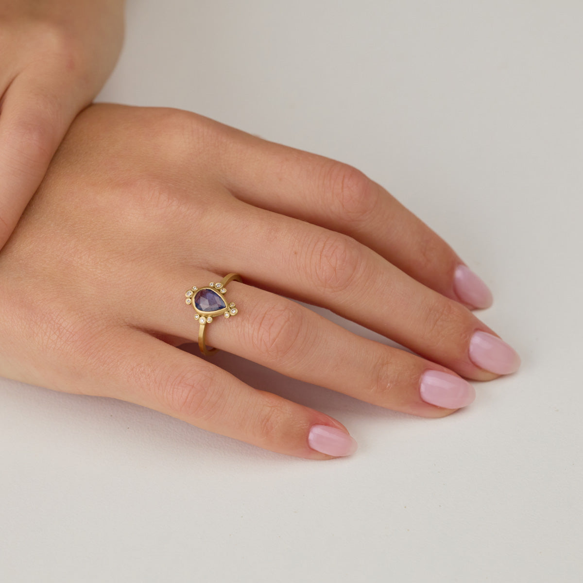 Blue Sapphire Teardrop Ring with Diamond Trios