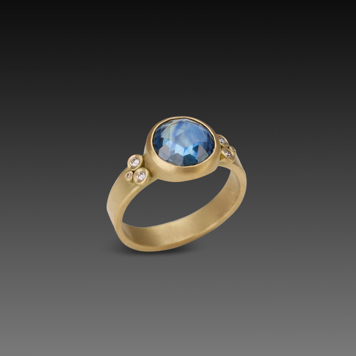 Glowing Blue Sapphire Ring with Diamonds