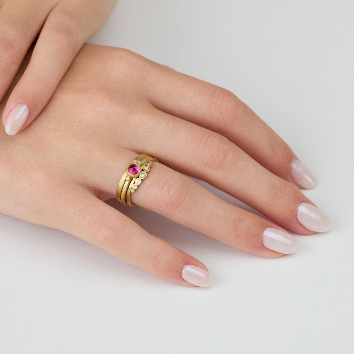 Delicate Ruby Ring with Two Diamonds