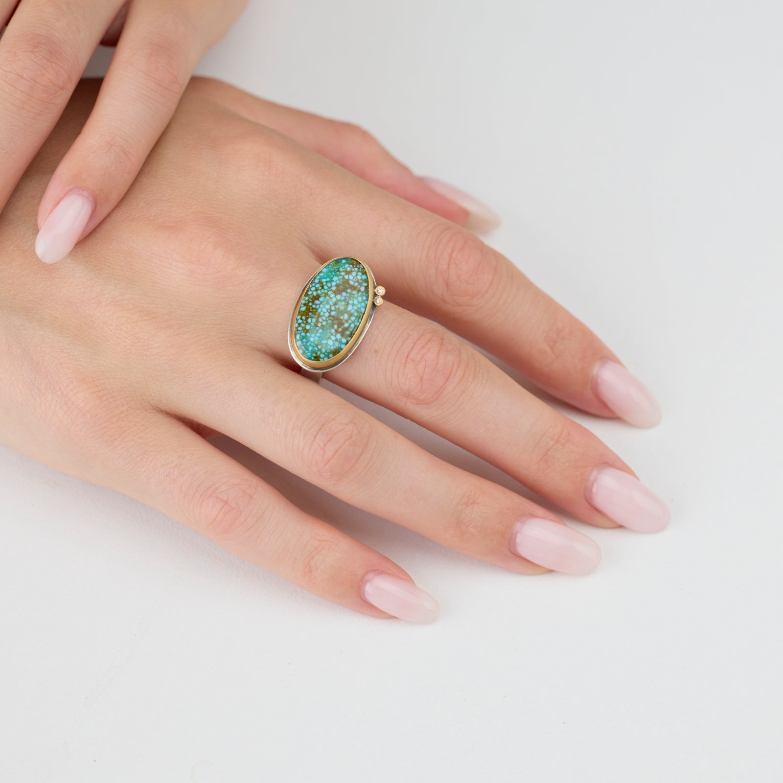Oval Turquoise Ring with Diamonds
