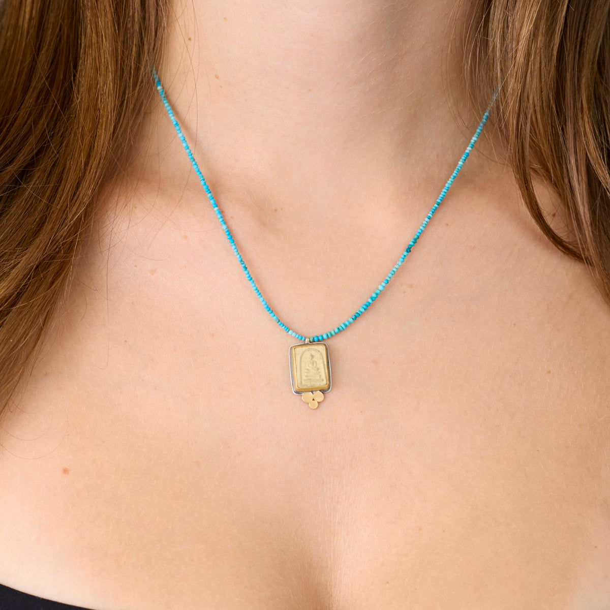 Buddha Amulet on Turquoise Strand