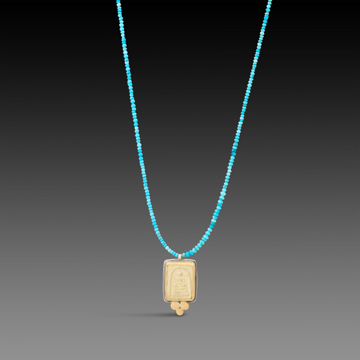 Buddha Amulet on Turquoise Strand