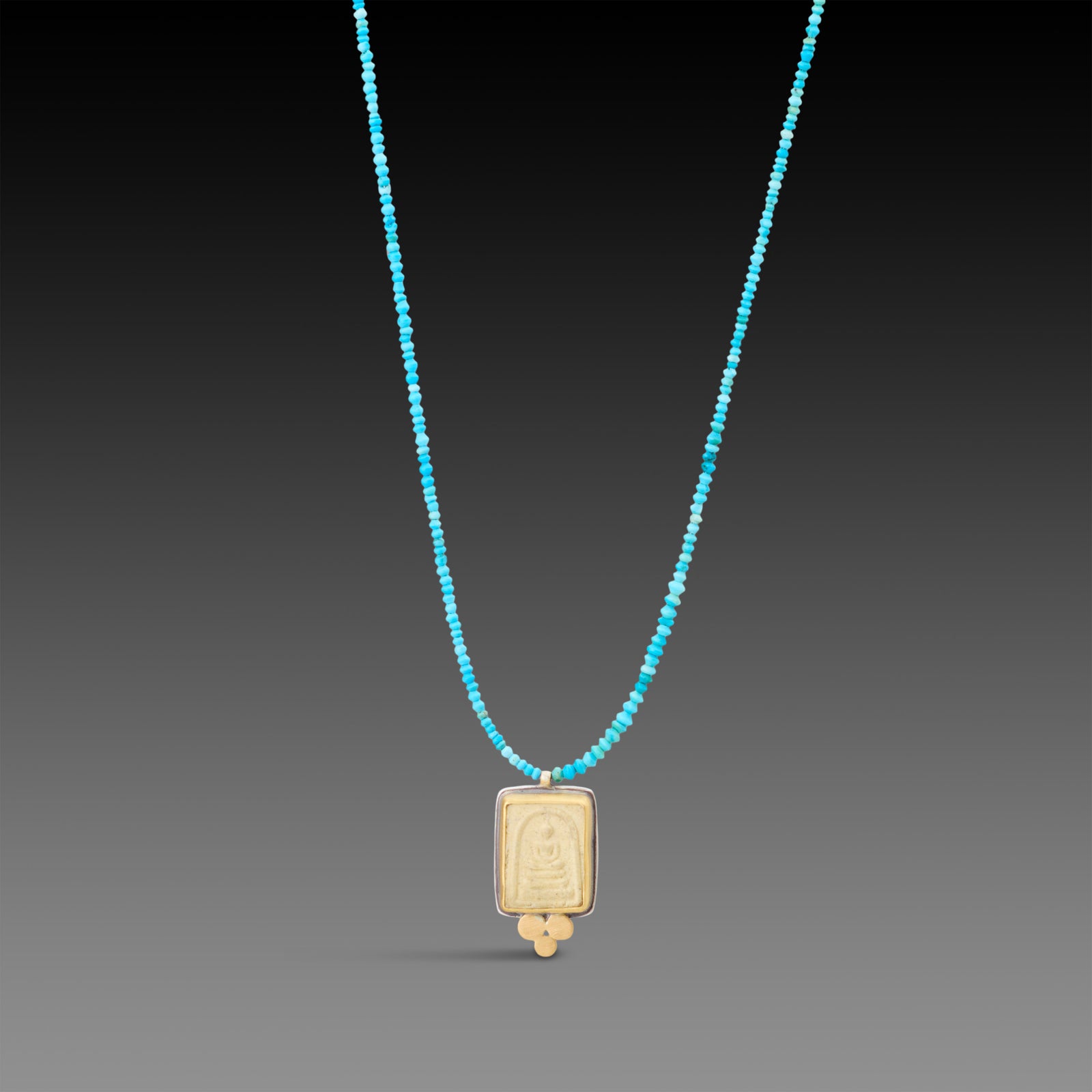 Buddha Amulet on Turquoise Strand