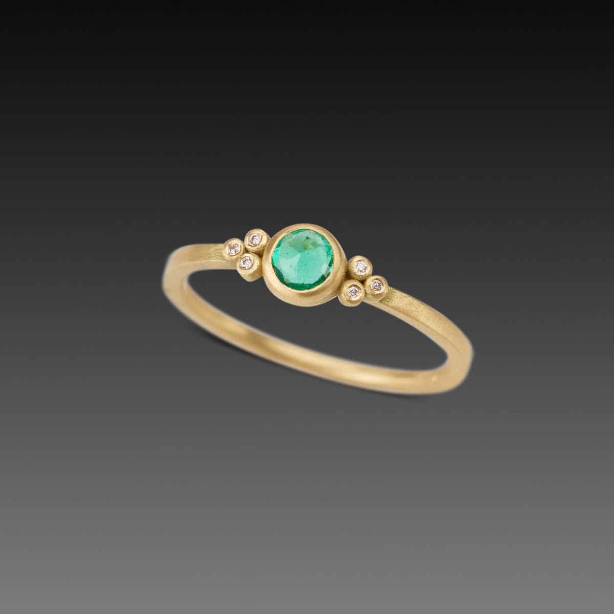 Delicate Emerald Ring with Diamond Trios