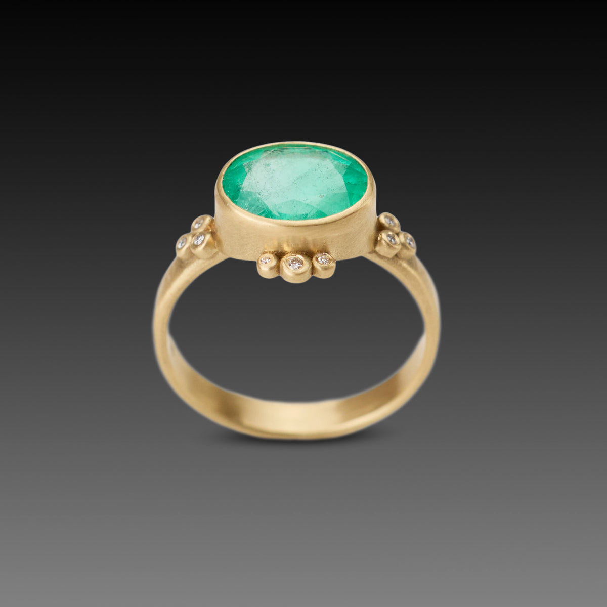 Oval Emerald Ring With Diamond Trios
