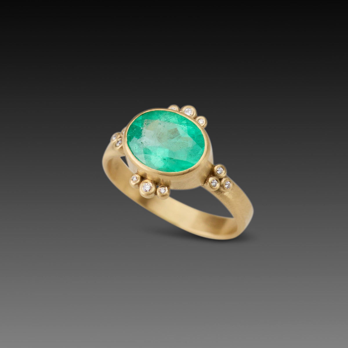 Oval Emerald Ring With Diamond Trios