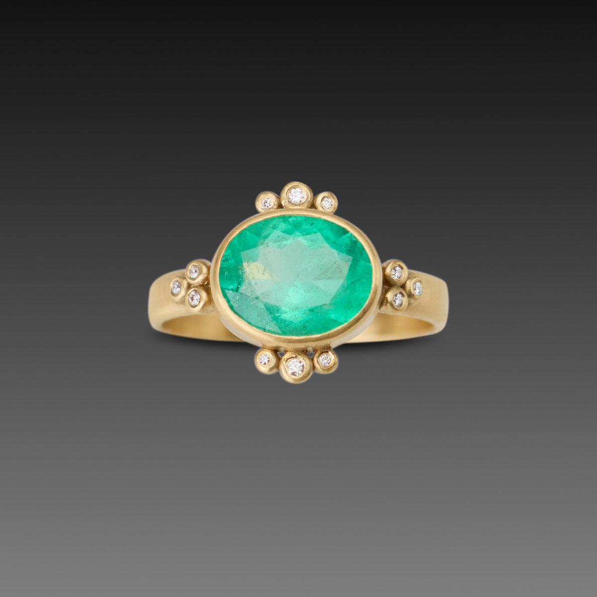 Oval Emerald Ring With Diamond Trios
