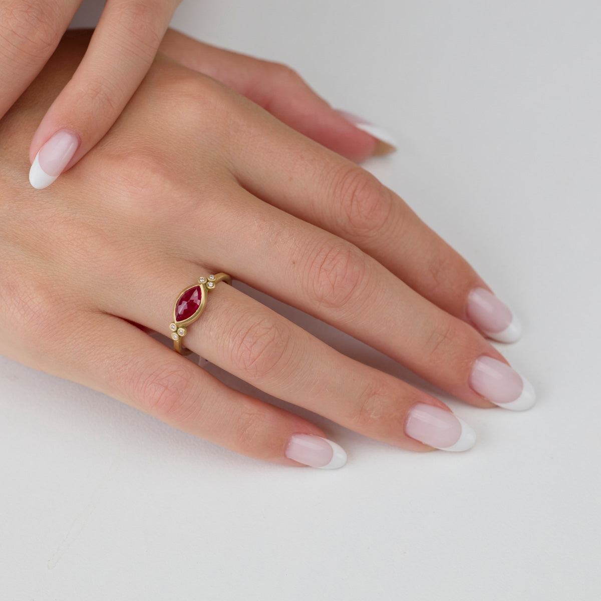Marquise Ruby Ring with Diamond Trios