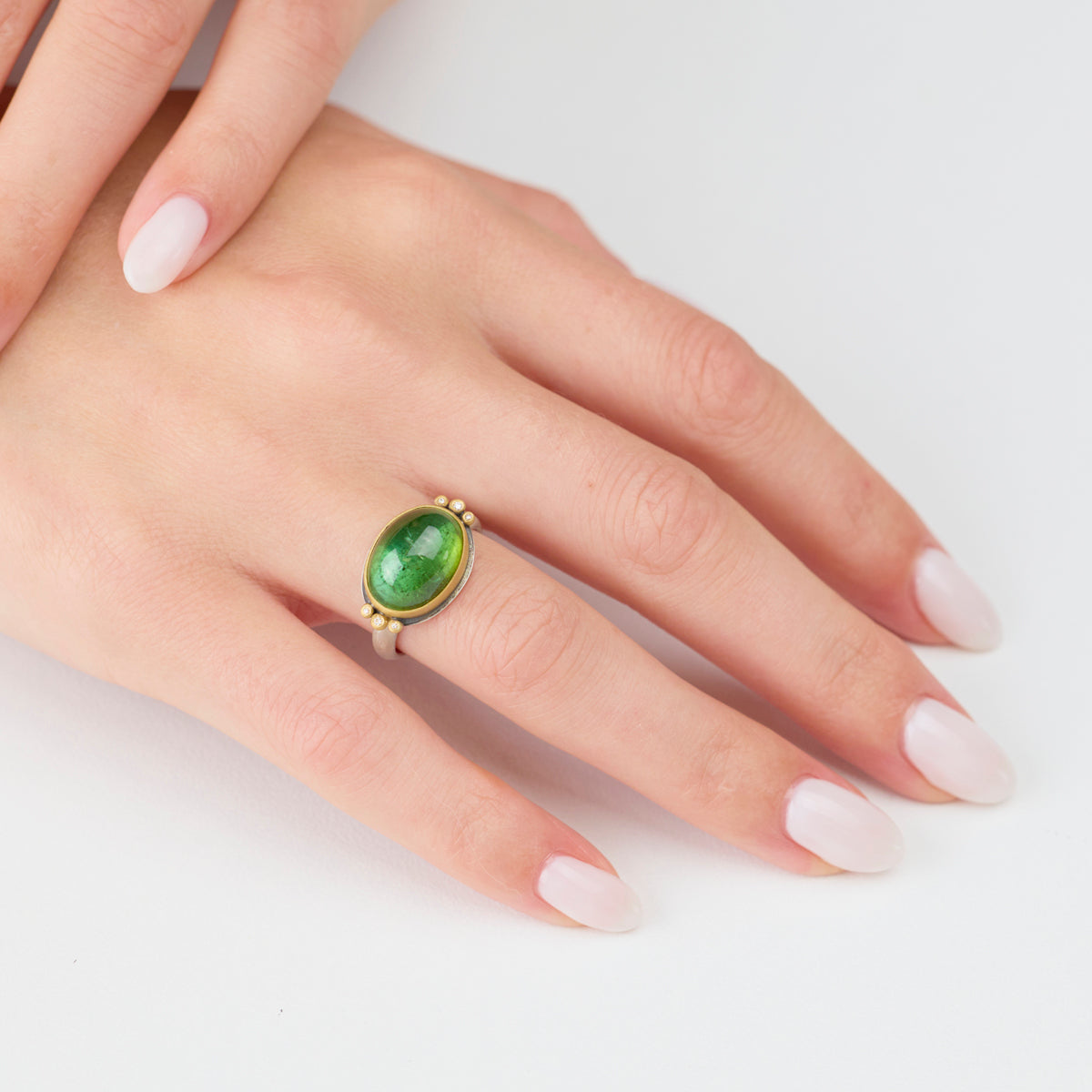 Smooth Green Tourmaline Ring with Diamond Trios