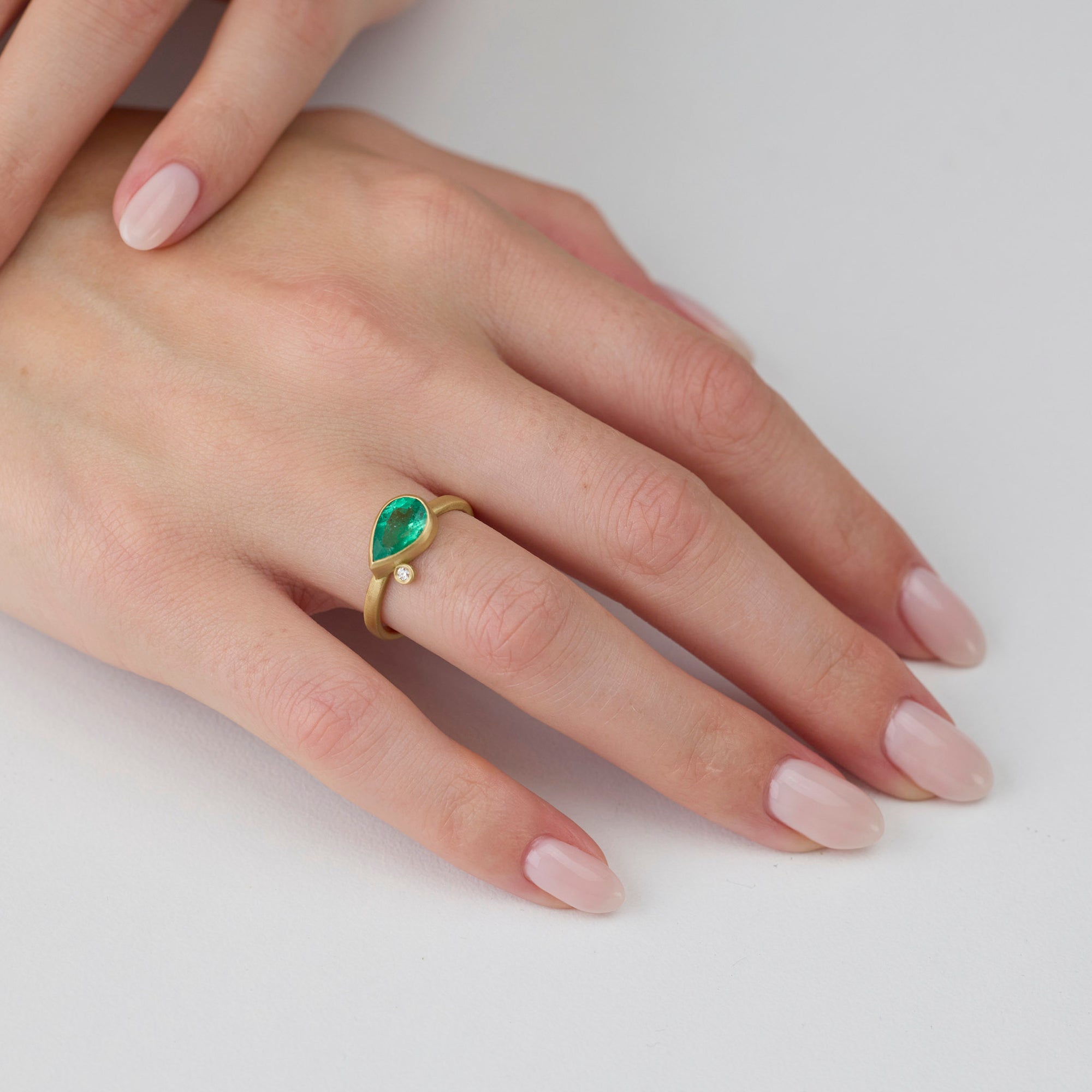 East West Emerald Ring