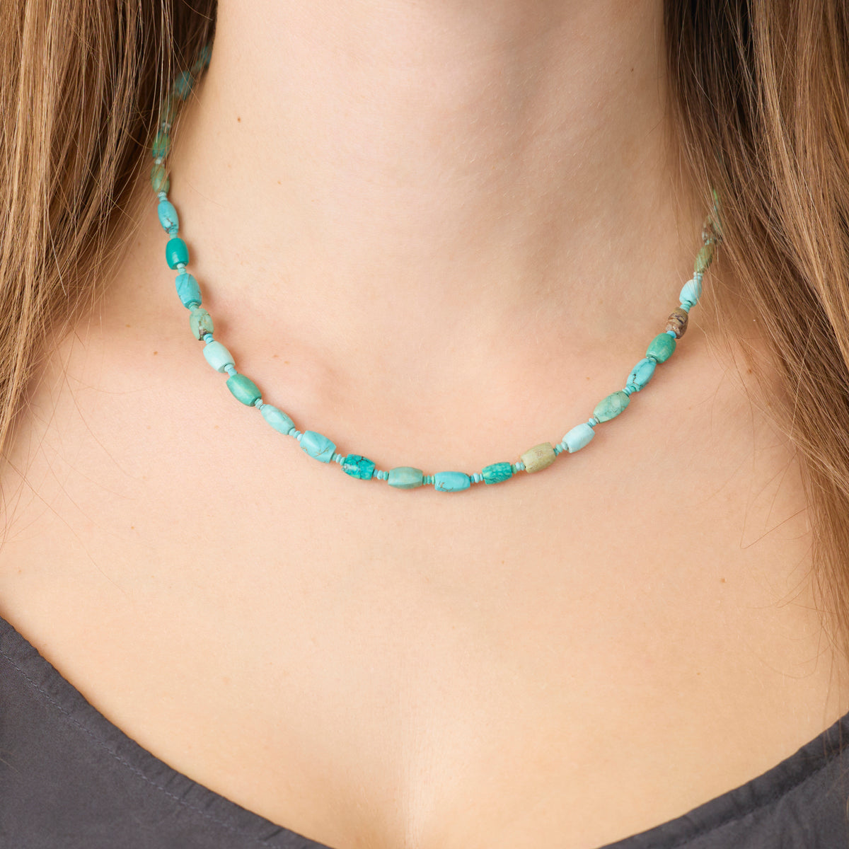 Turquoise Necklace with Gold Trio Charm
