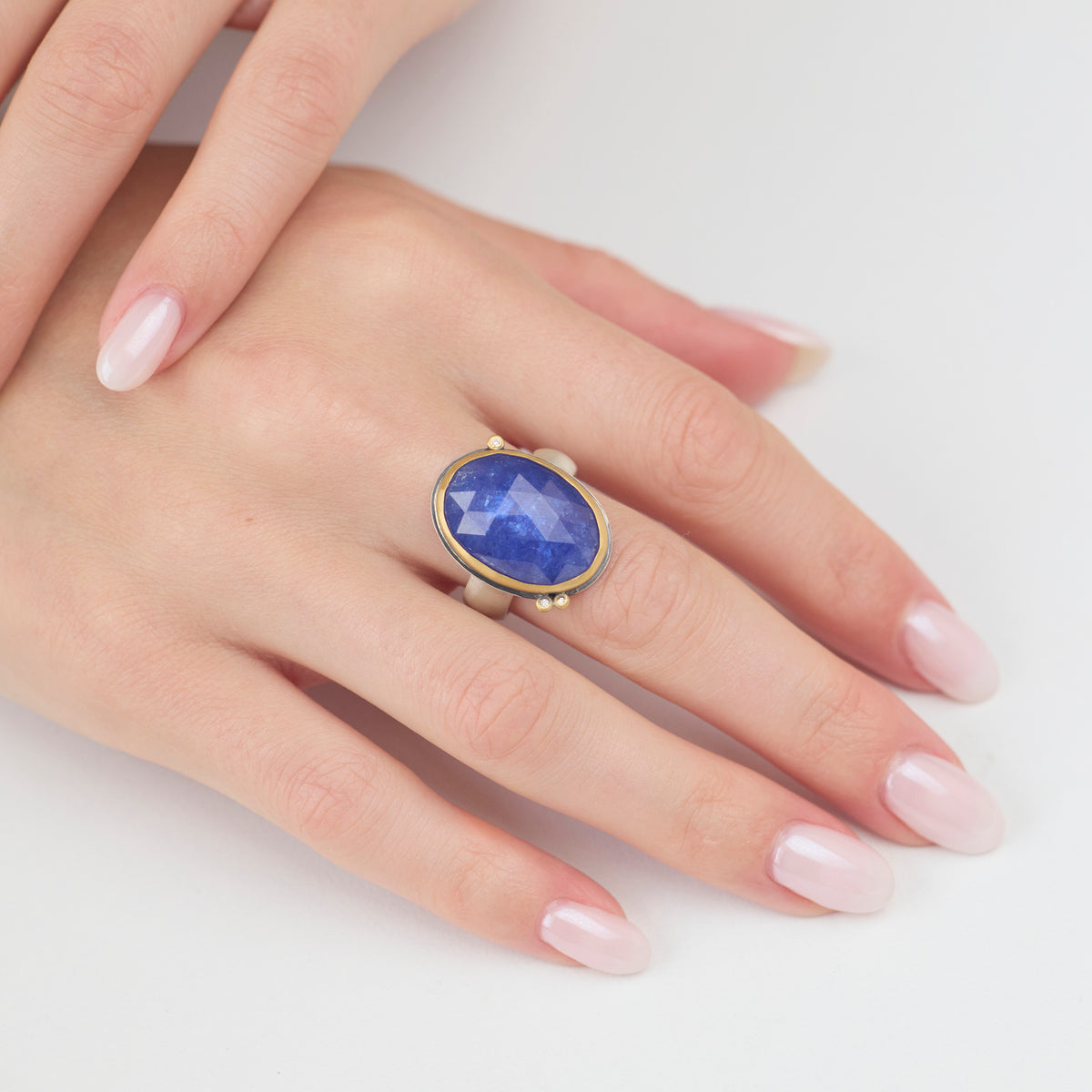Oval Tanzanite Ring with Diamonds