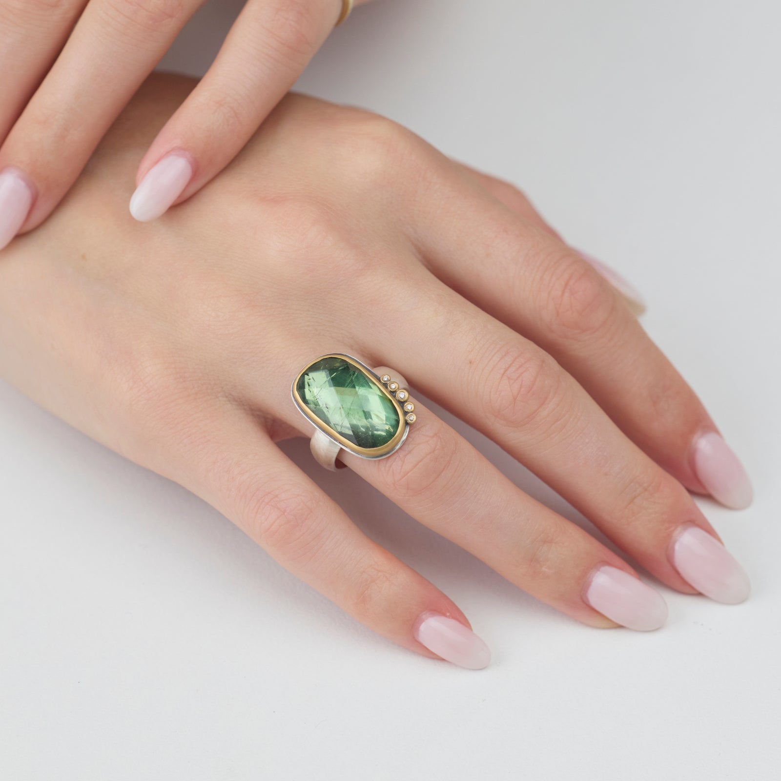 Green Tourmaline Ring with Diamond Arc