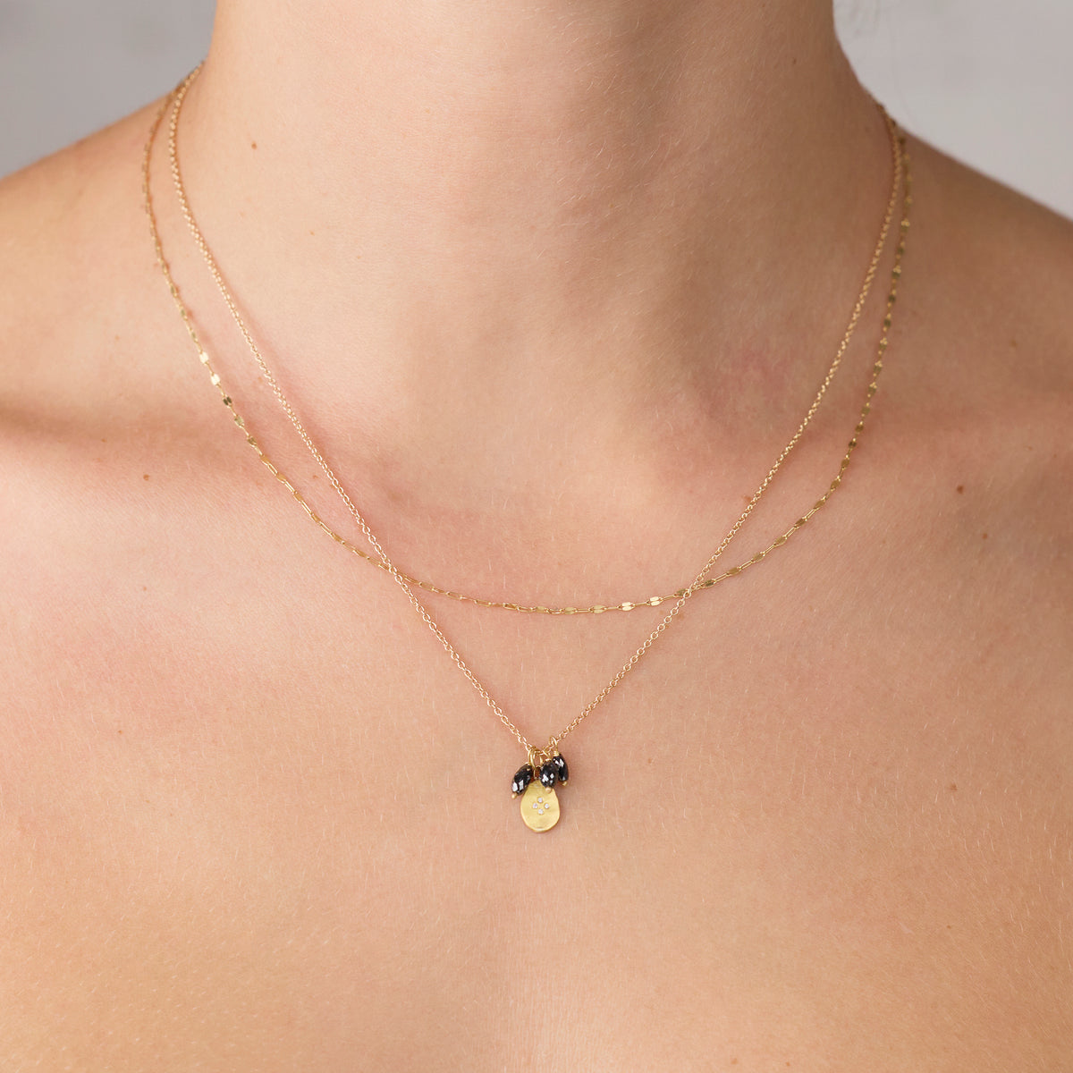 Gold Charm Necklace with Black Diamond Beads