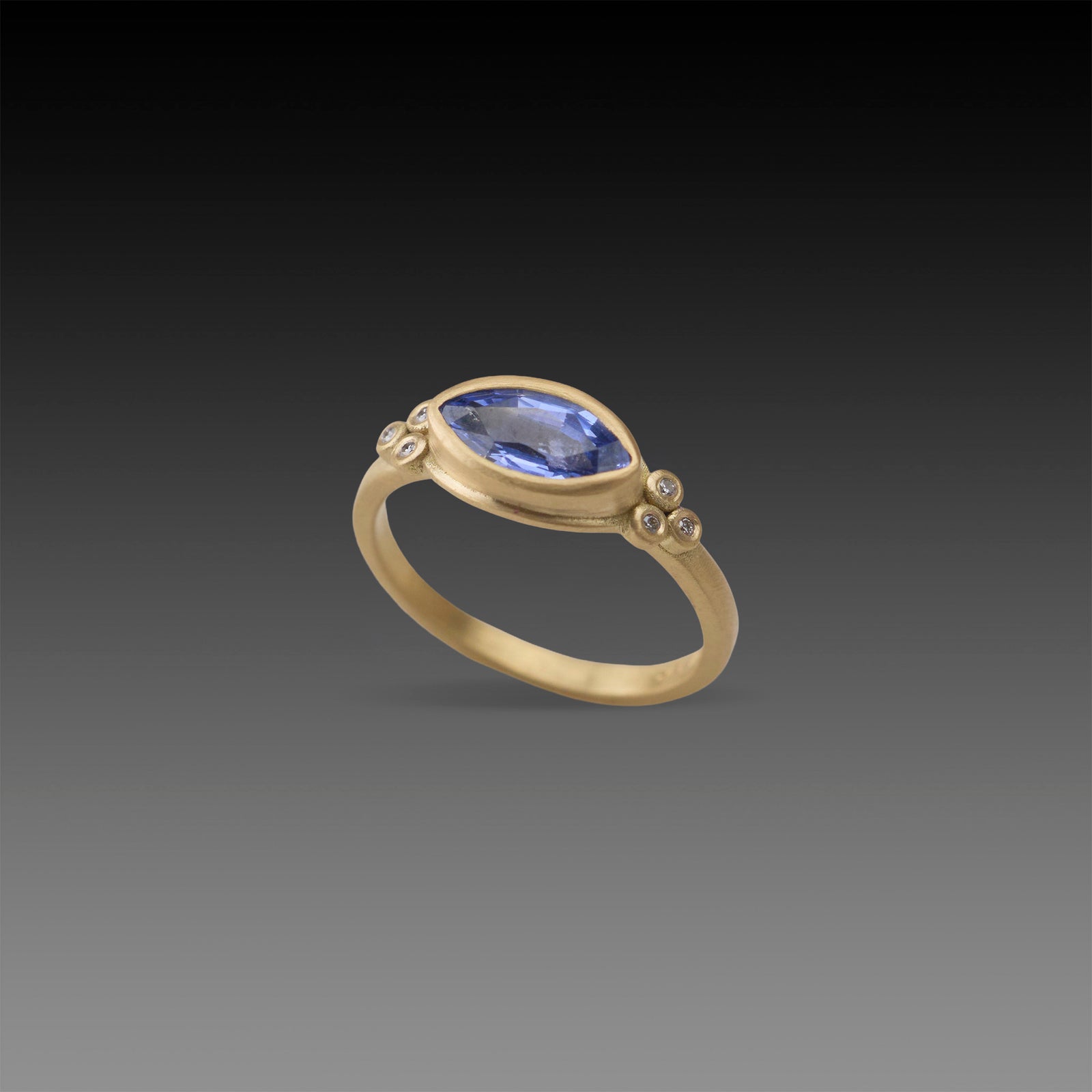 Blue Sapphire Marquise Ring with Diamond Trios