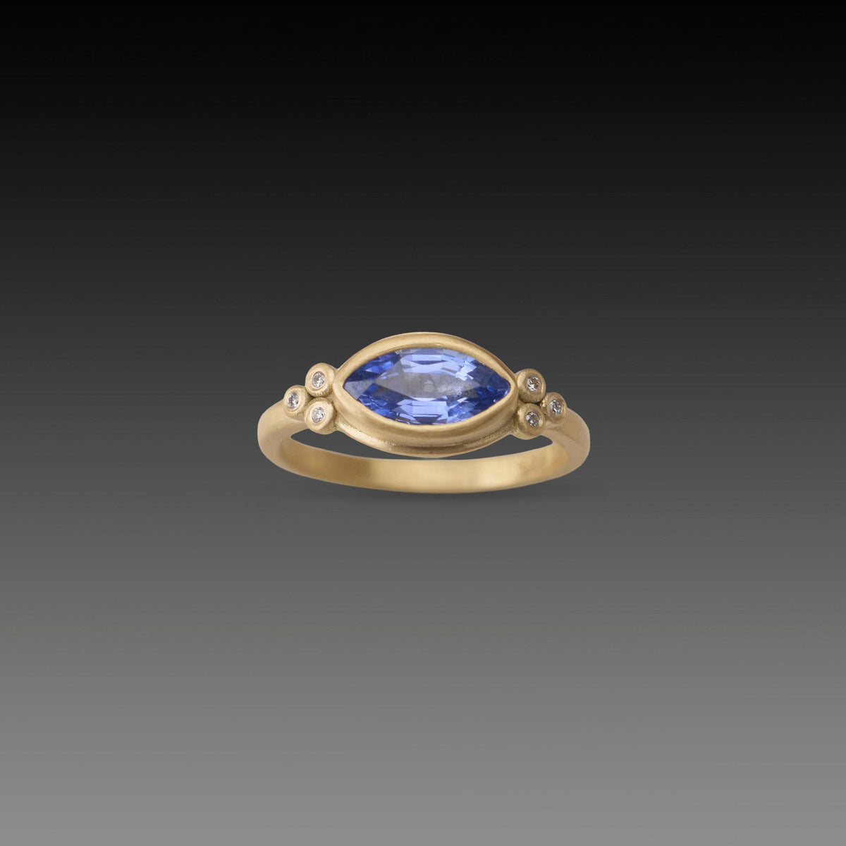 Blue Sapphire Marquise Ring with Diamond Trios