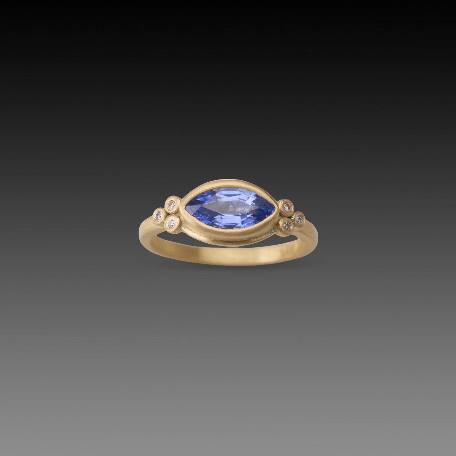 Blue Sapphire Marquise Ring with Diamond Trios