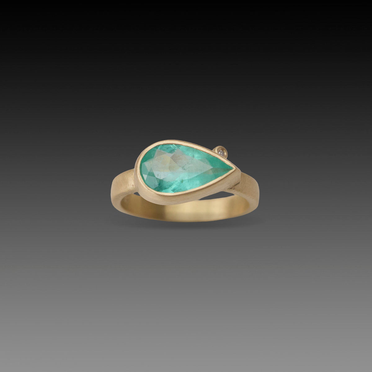 Large East West Emerald Ring
