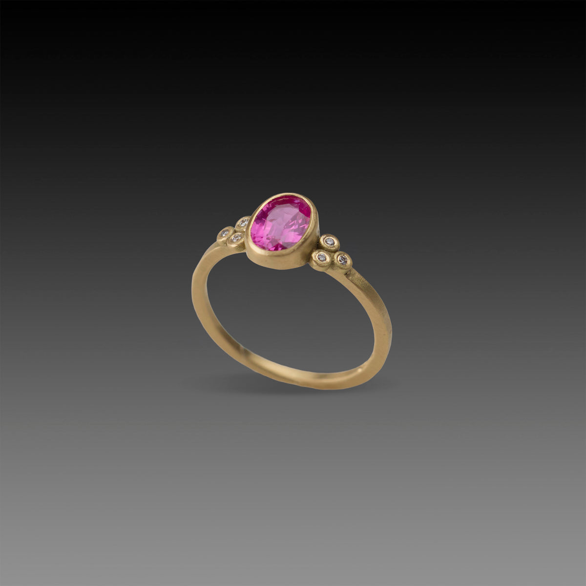 Magenta Sapphire Oval Ring with Diamonds
