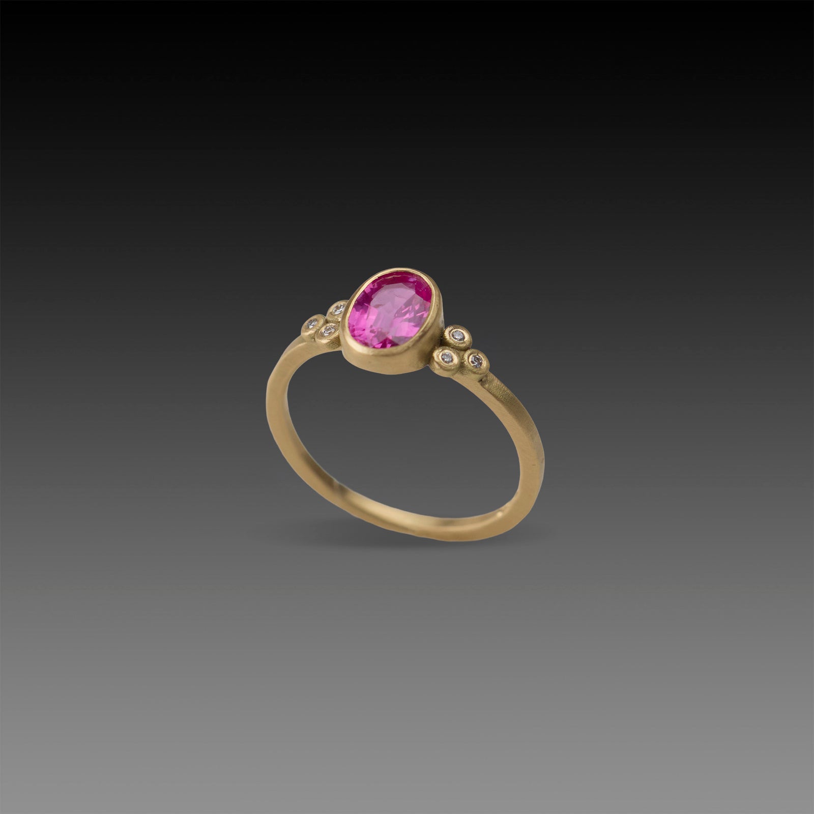 Magenta Sapphire Oval Ring with Diamonds