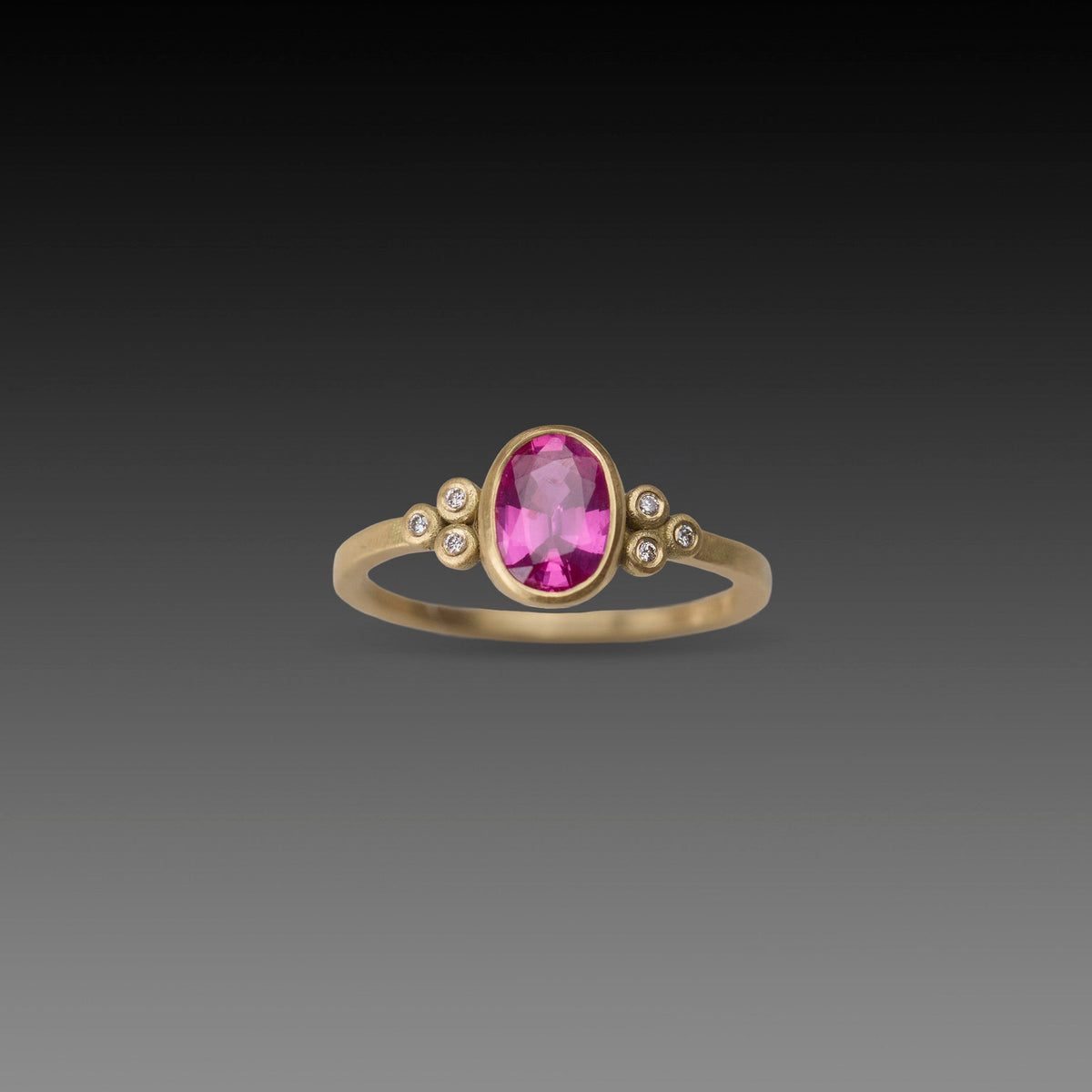 Magenta Sapphire Oval Ring with Diamonds