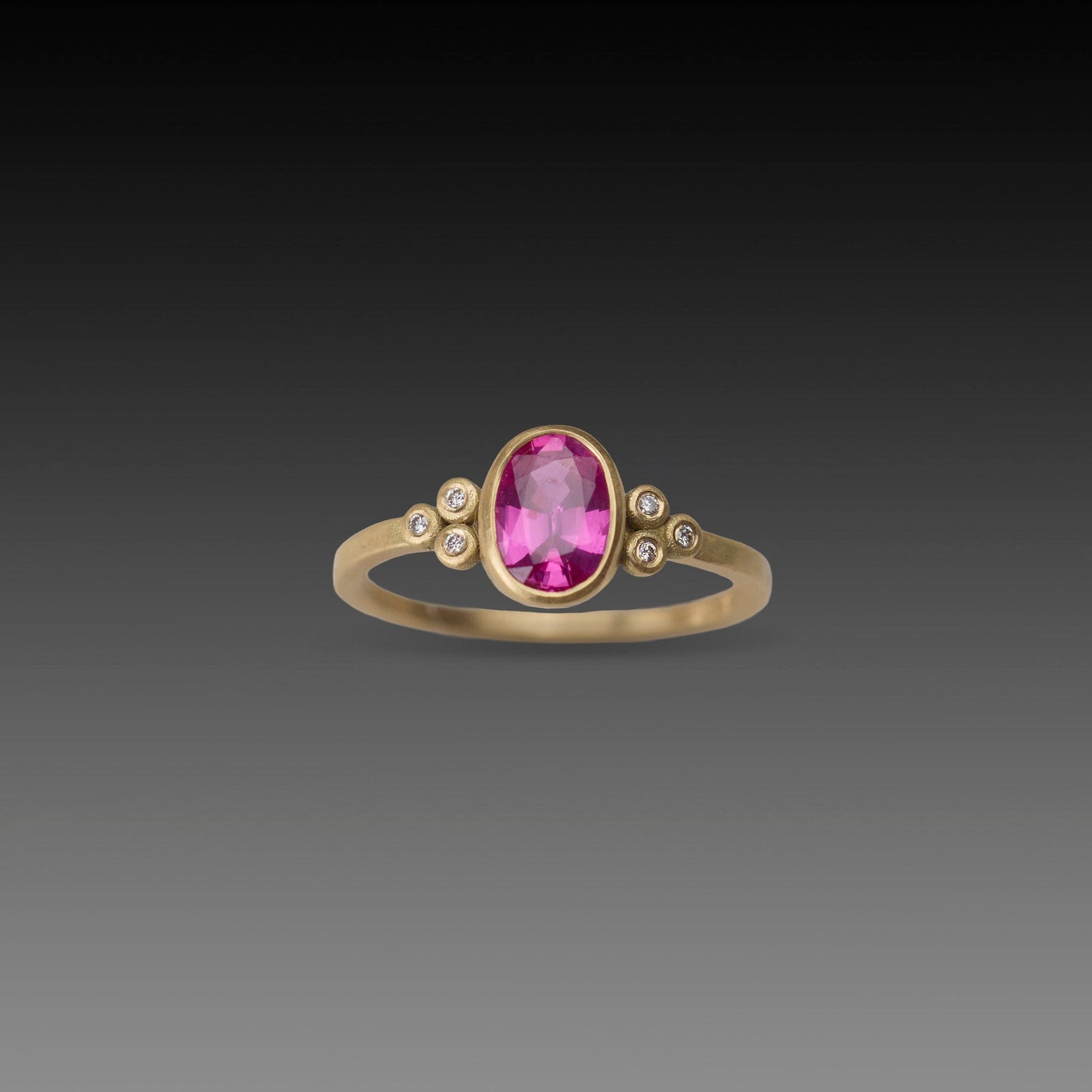 Magenta Sapphire Oval Ring with Diamonds