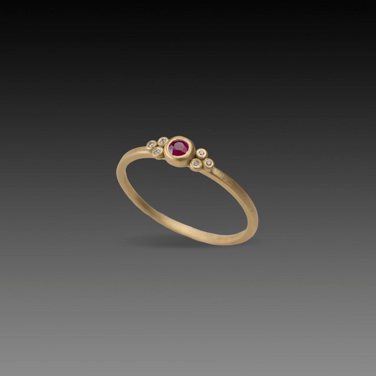 Delicate Ruby Ring with Diamond Trios