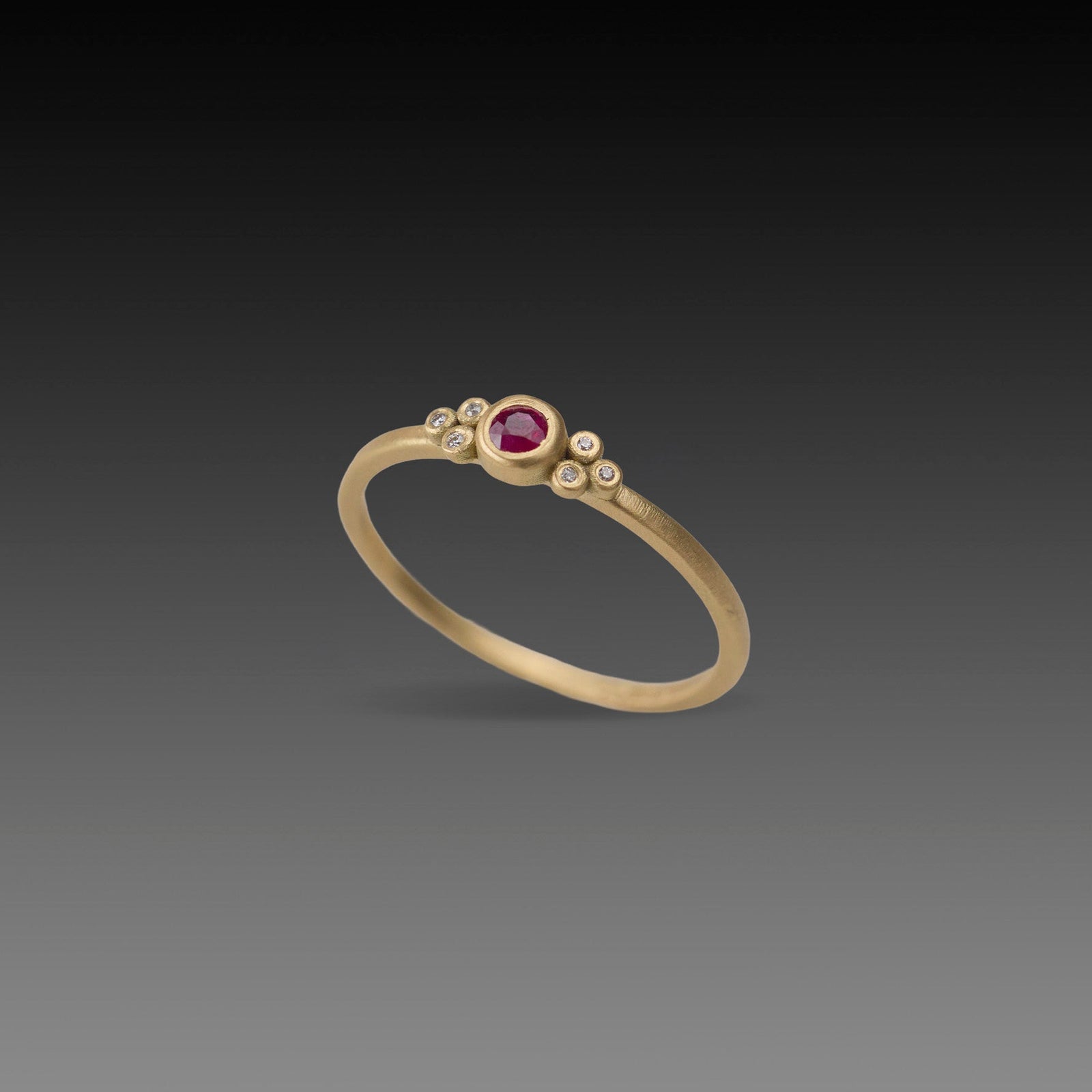 Delicate Ruby Ring with Diamond Trios