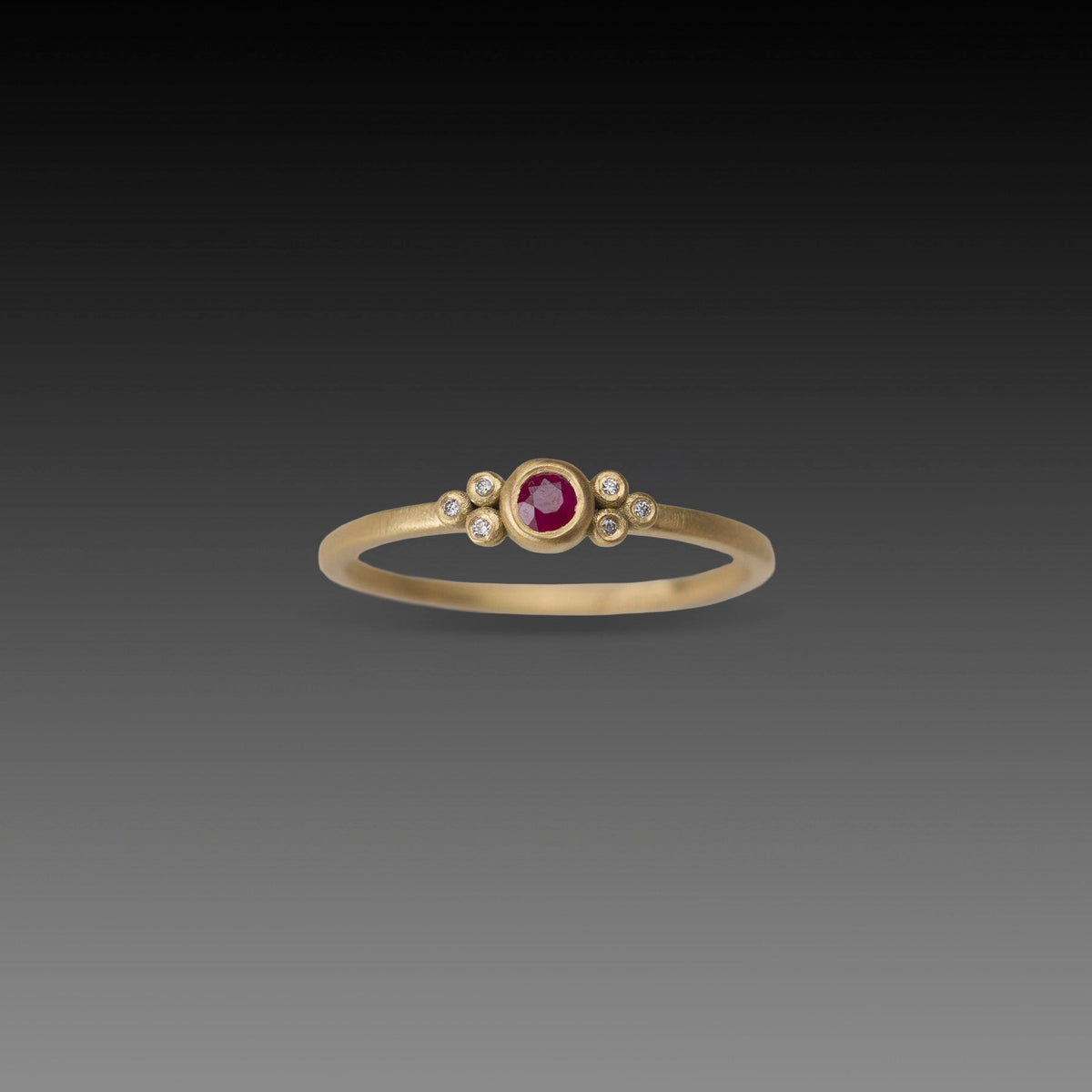 Delicate Ruby Ring with Diamond Trios