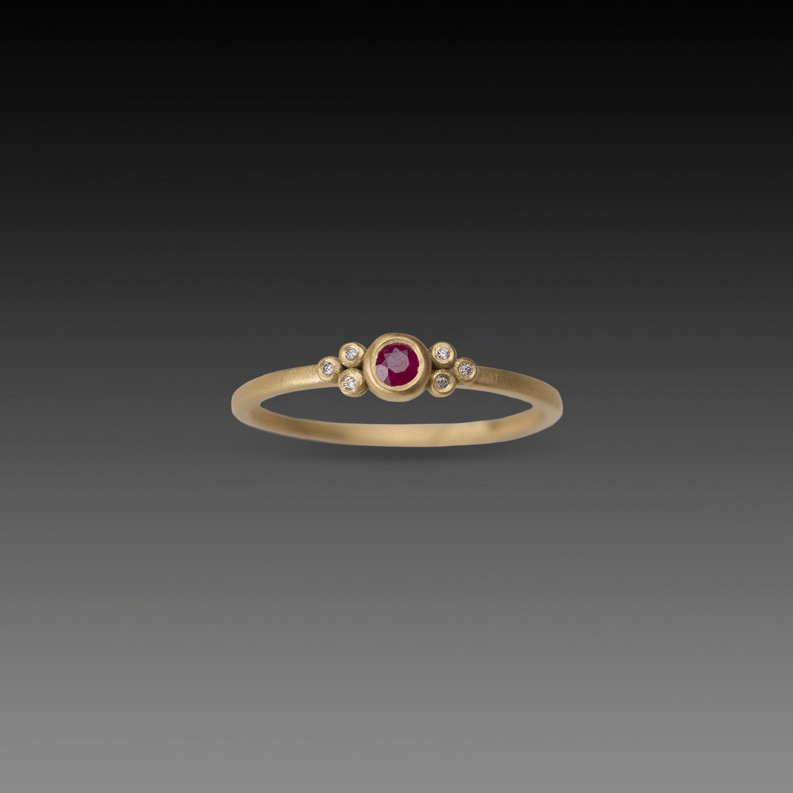 Delicate Ruby Ring with Diamond Trios