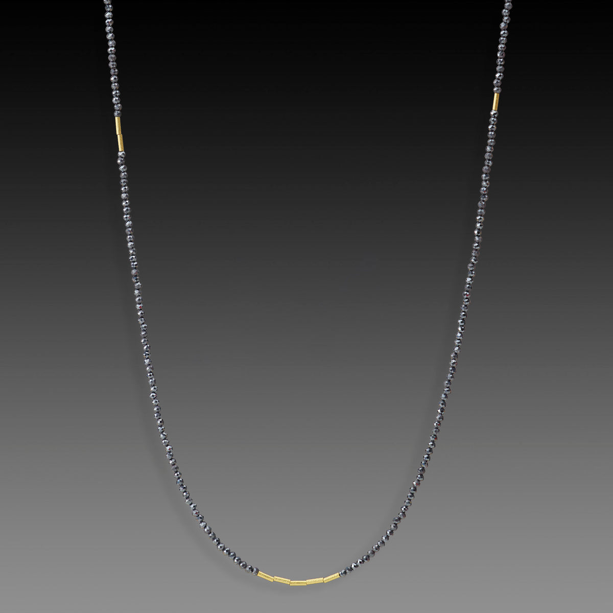Long Hematite Necklace with Gold Beads