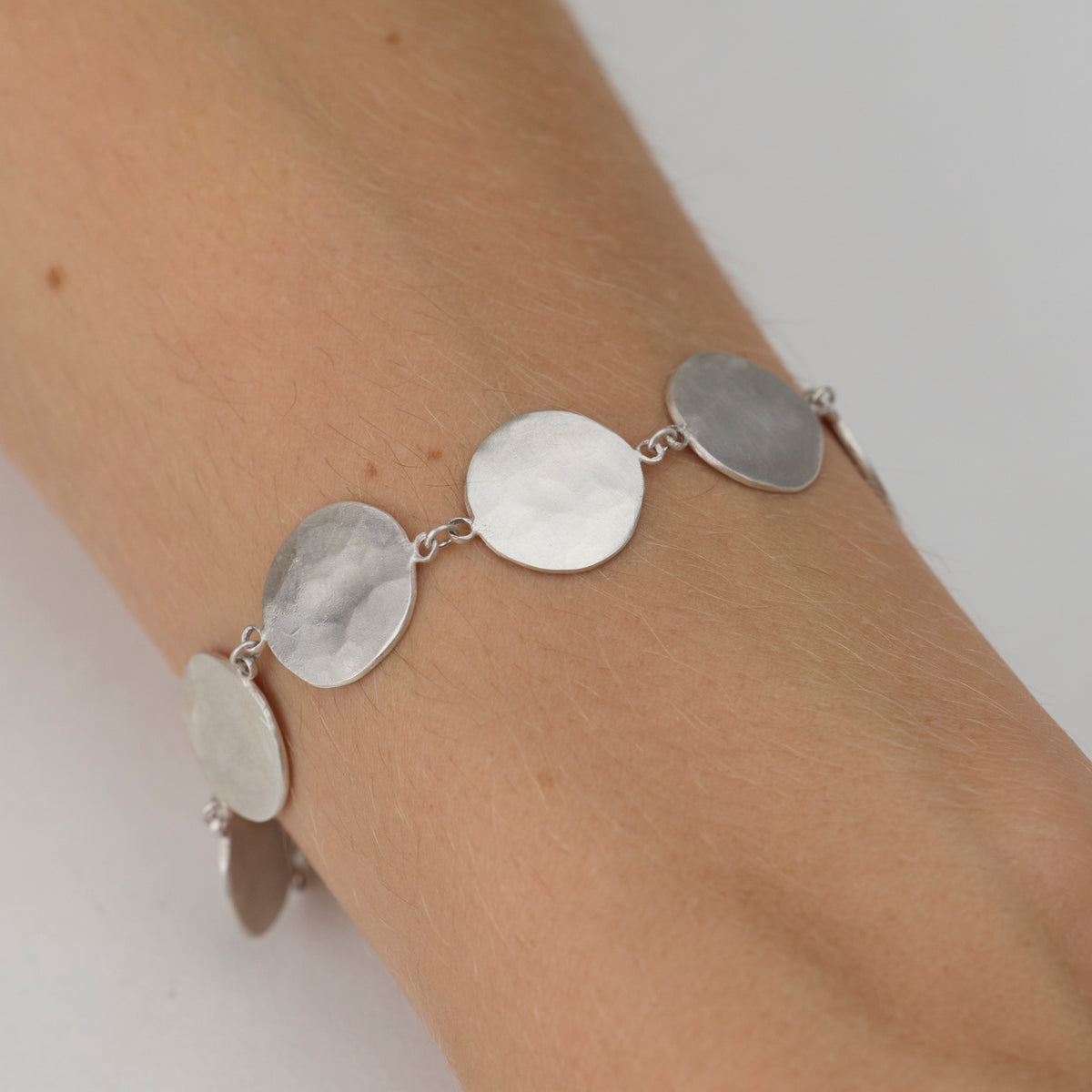 Silver Hammered Disk Bracelet