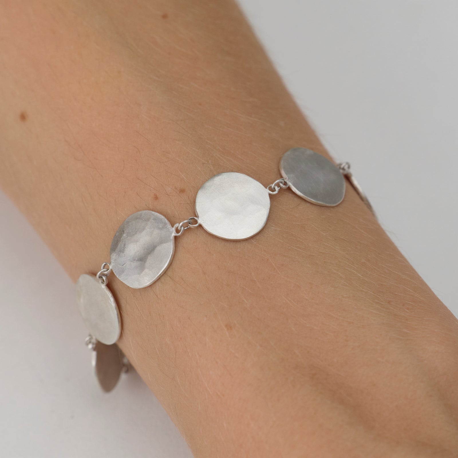 Silver Hammered Disk Bracelet