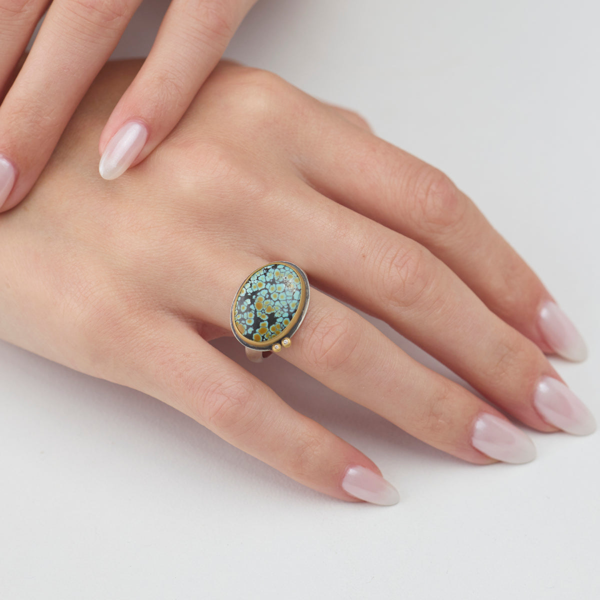 Oval Turquoise Ring with Diamonds