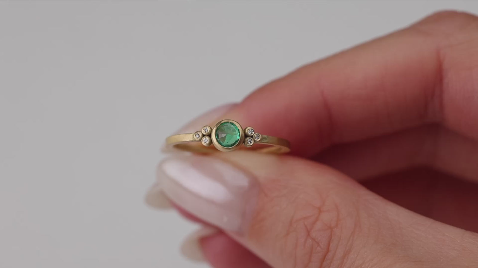 Delicate Emerald Ring with Diamond Trios