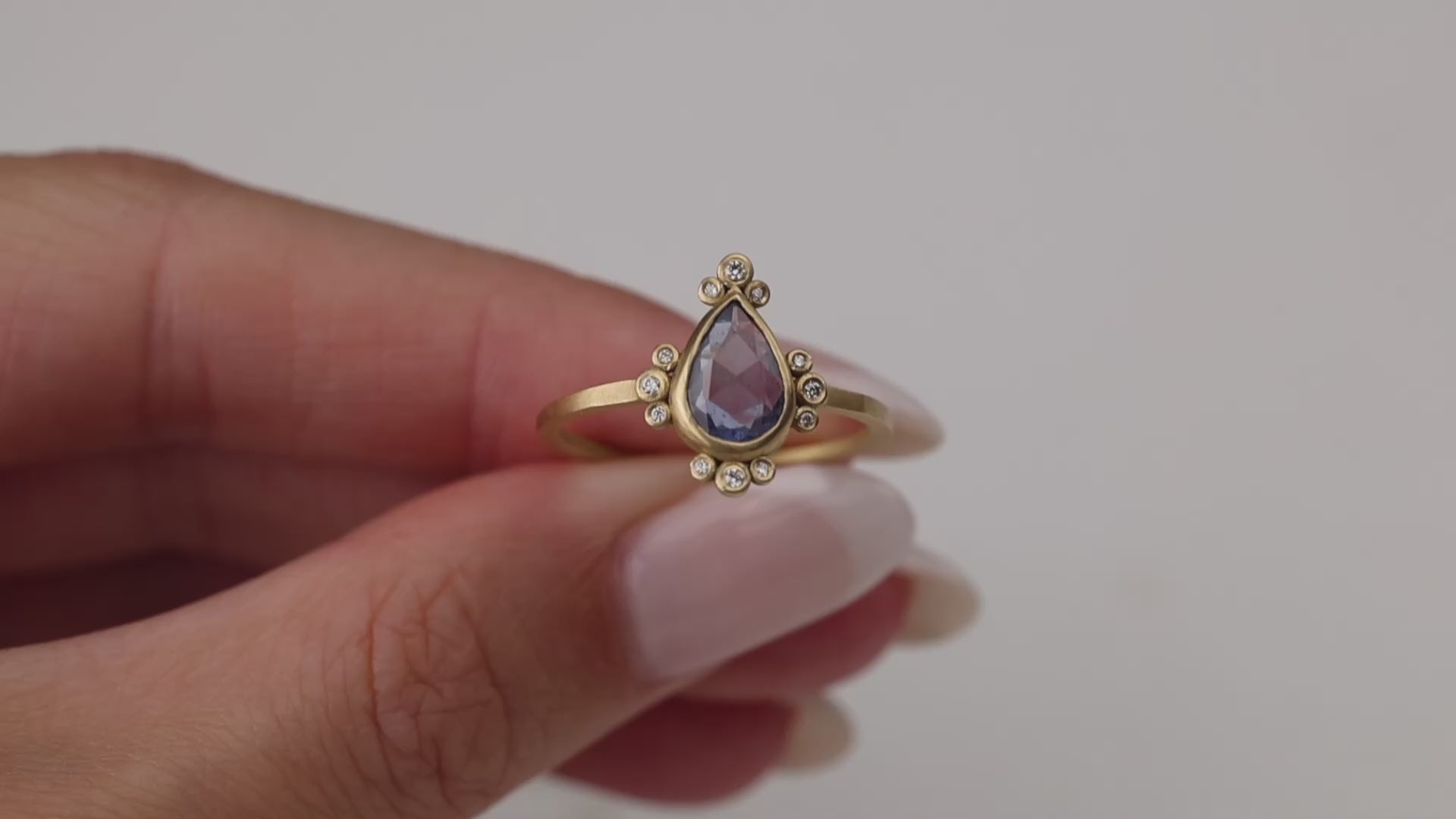 Blue Sapphire Teardrop Ring with Diamond Trios