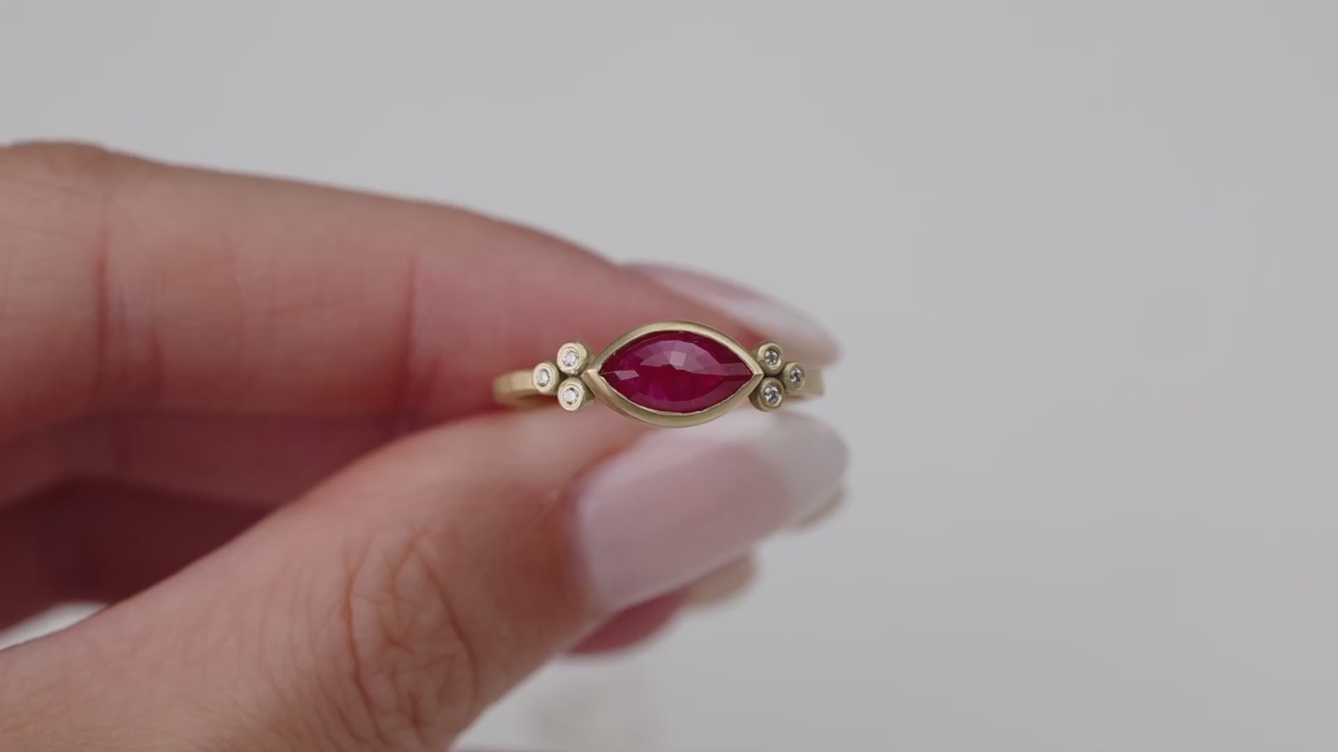 Marquise Ruby Ring with Diamond Trios