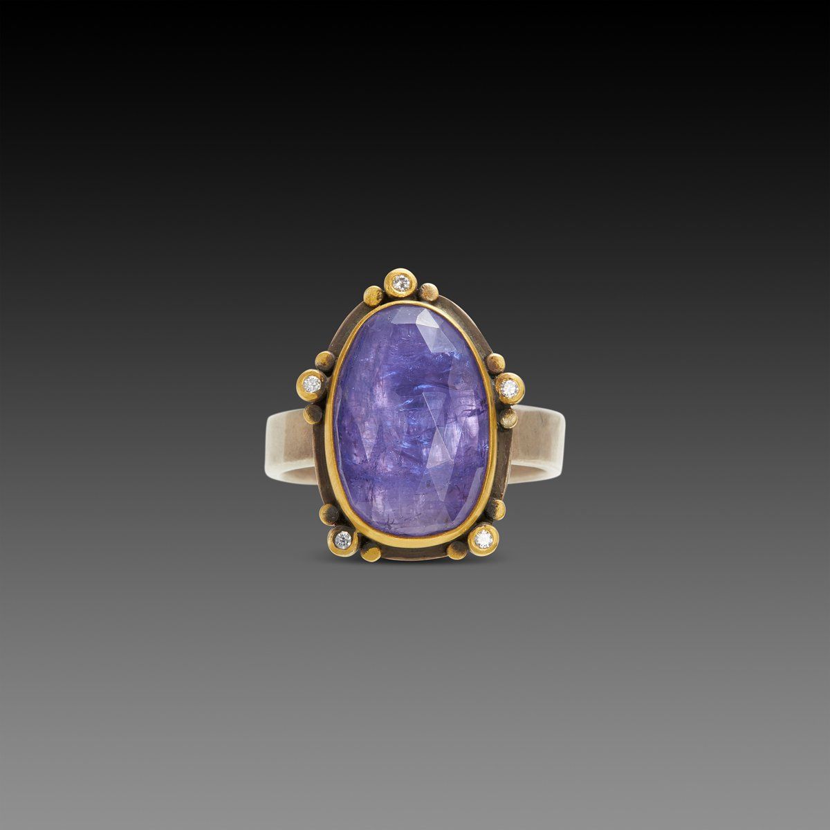 Tanzanite Ring with 22k Trios and Diamonds