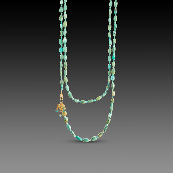 Long Turquoise Necklace with Gold Trio Charm