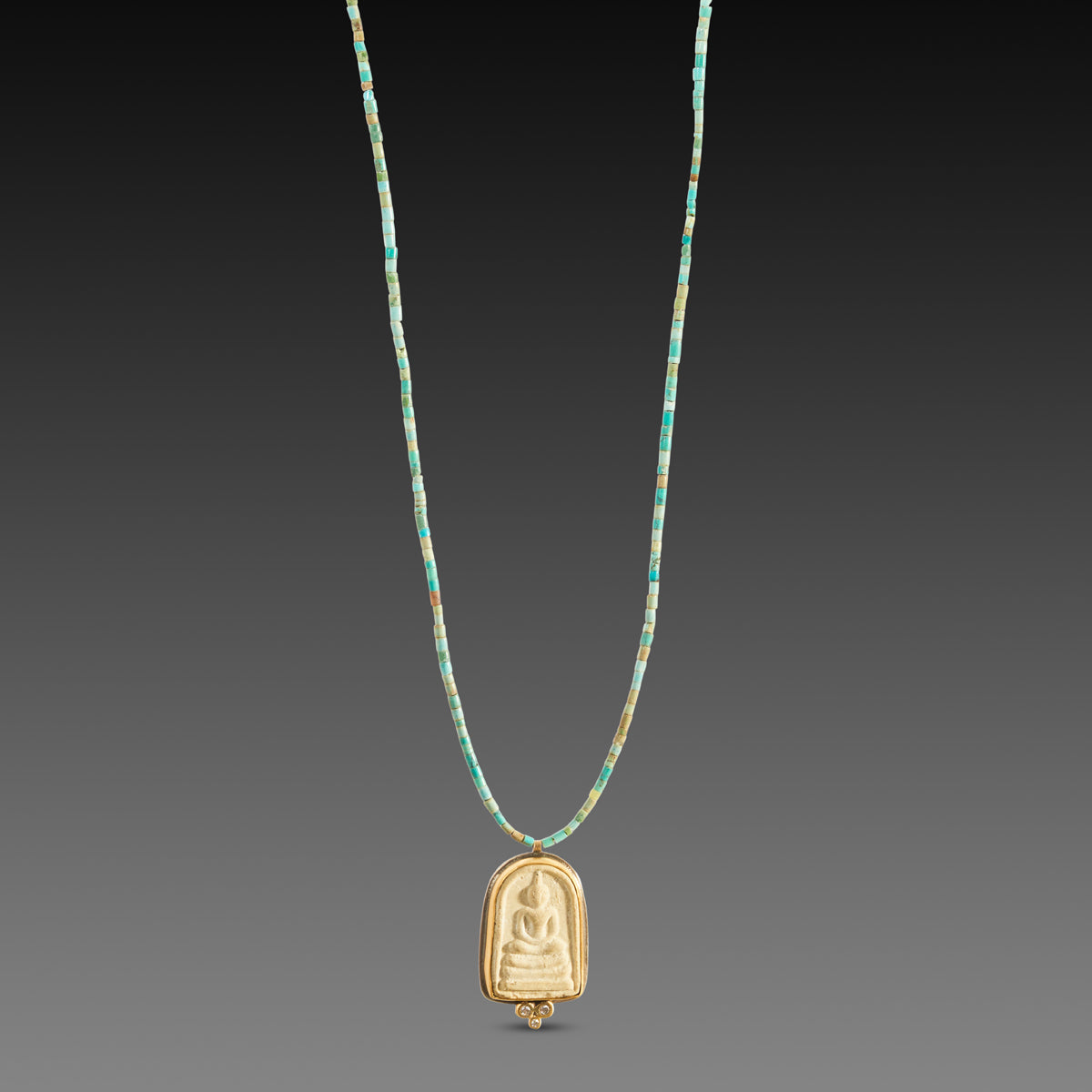 Buddha Amulet on Turquoise Strand