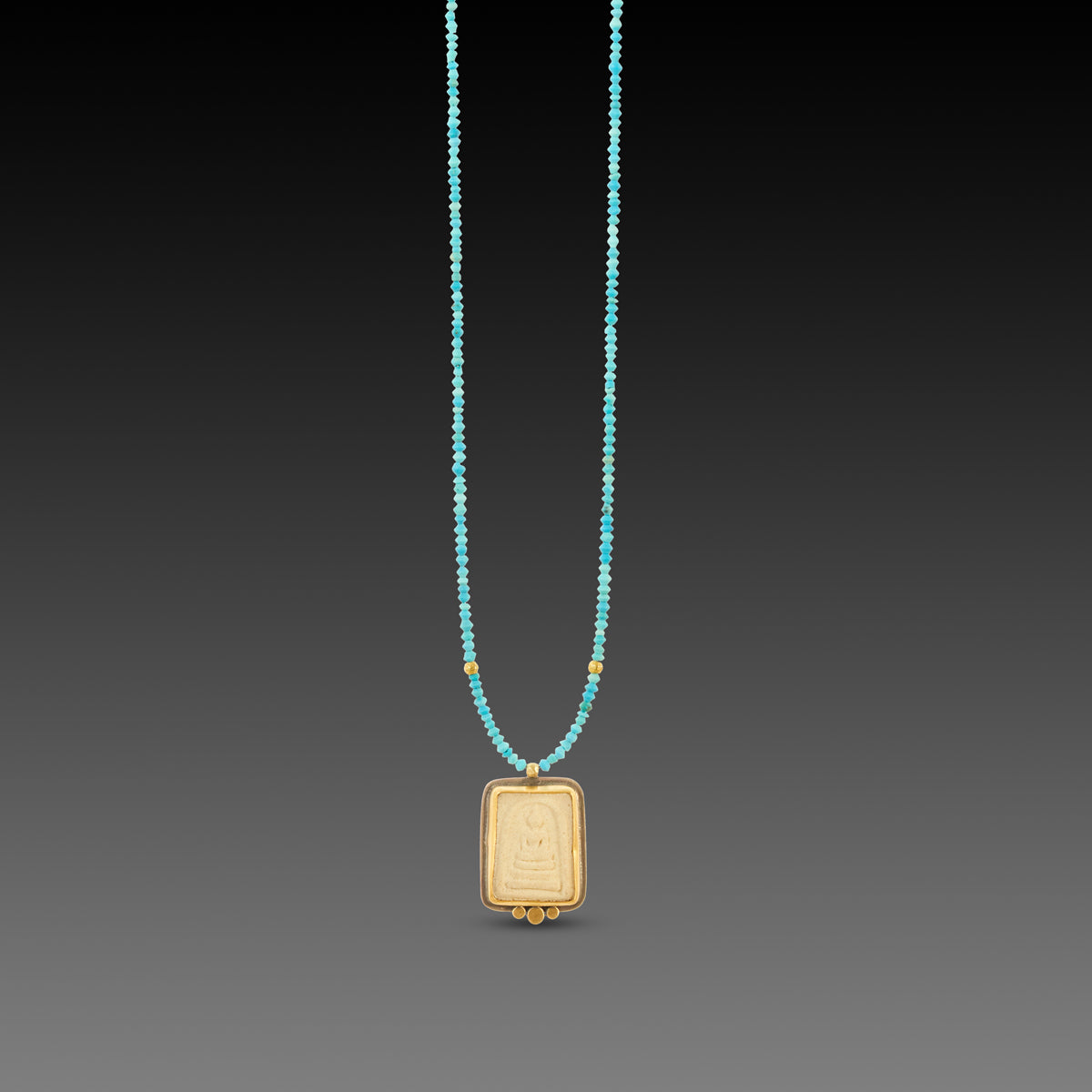 Buddha Amulet on Turquoise Strand