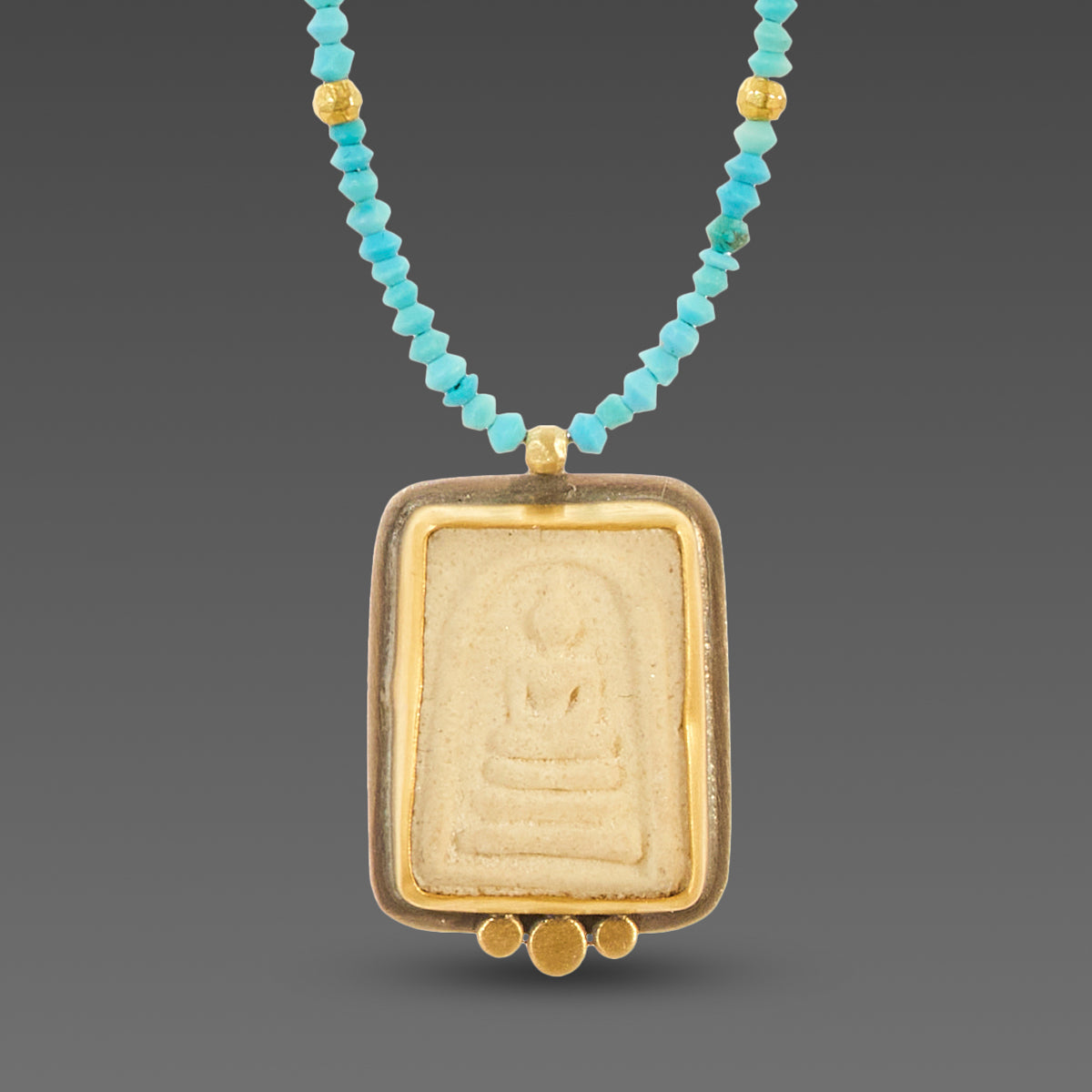 Buddha Amulet on Turquoise Strand